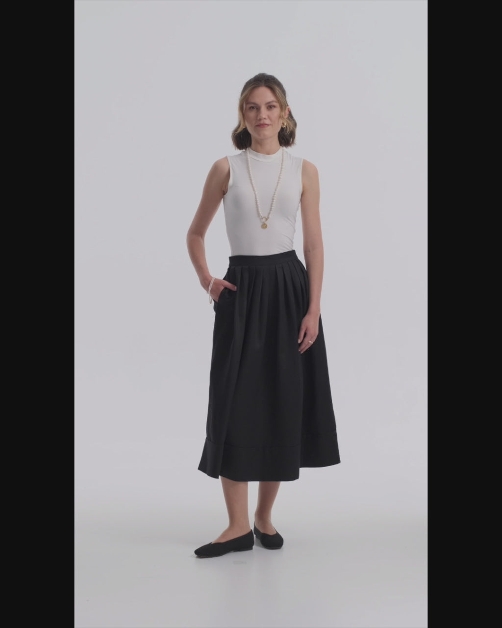 Milos Noir Midi Skirt